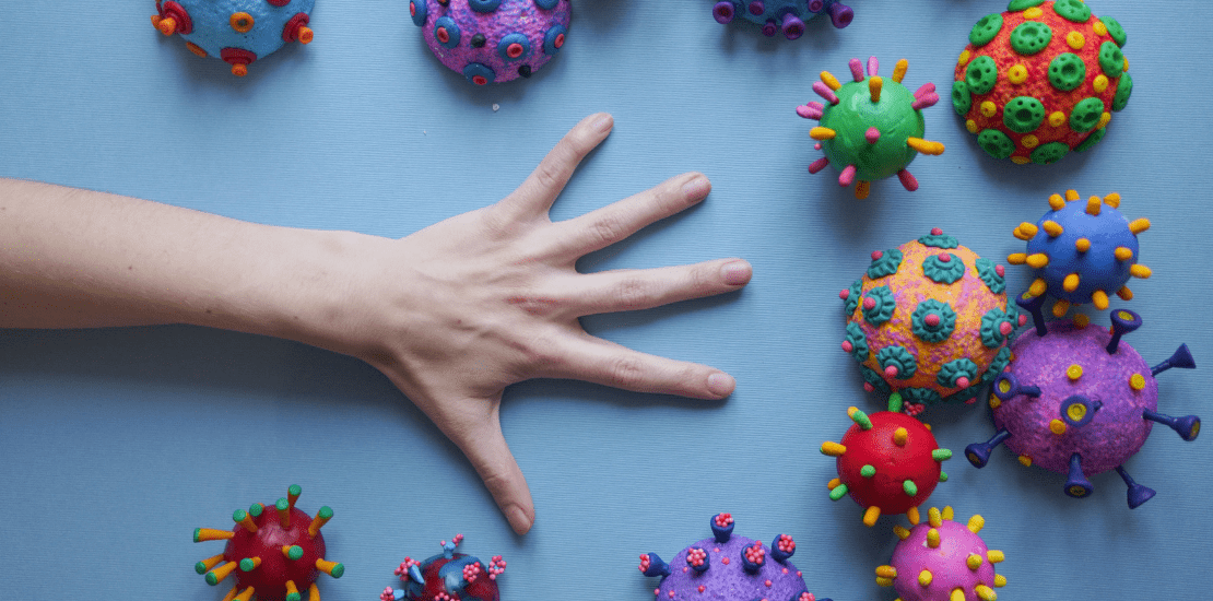 a hand and bacteria